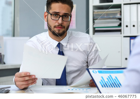 Group of people hold in arms financial papers solve and discuss problem Group of people hold in arms financial papers solve and discuss problem 46067775