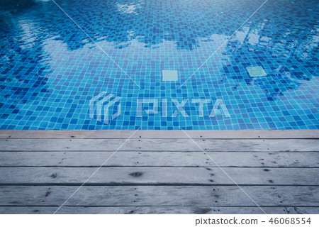 Photo of Water in a swimming pool with sunny Photo of Water in a swimming pool with sunny 46068554