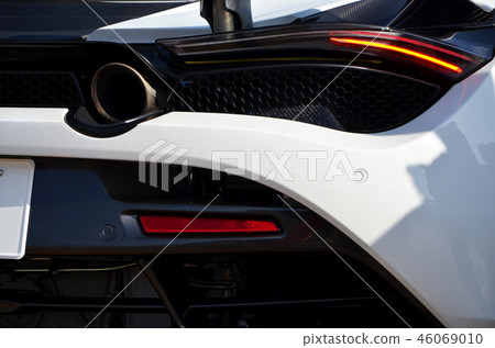 Back shot of a white sports car [car] 46069010