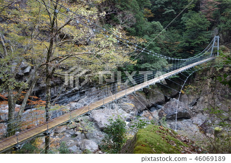 Long suspension bridge in the unexplored Osugi valley 46069189