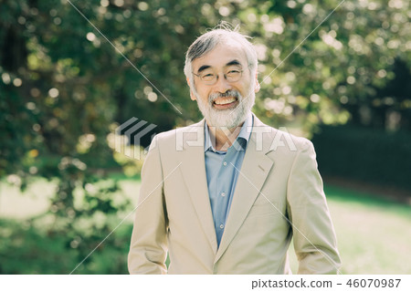 Smiling senior man in the park 46070987