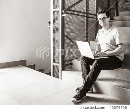 young freelancer man using laptop computer young freelancer man using laptop computer 46074706