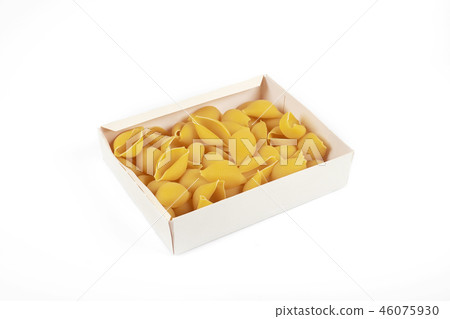 uncooked conchiglioni pasta shells in box , isolated on a white background. uncooked conchiglioni pasta shells in box , isolated on a white background. 46075930