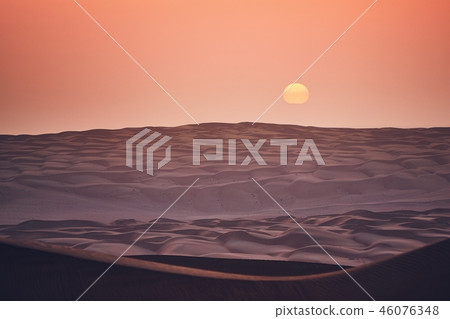 Sand dunes at sunrise 46076348
