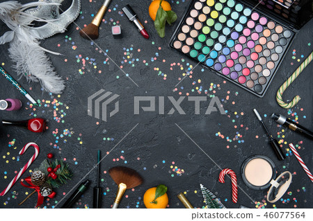 Picture from above of accessories for makeup artist, mandarin, Christmas fir, sugar cane Picture from above of accessories for makeup artist, mandarin, Christmas fir, sugar cane 46077564
