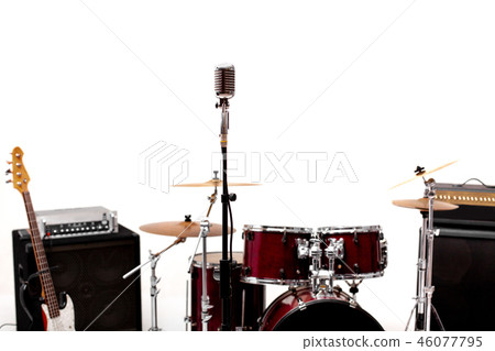 Microphone in a recording studio with drum on background. 46077795