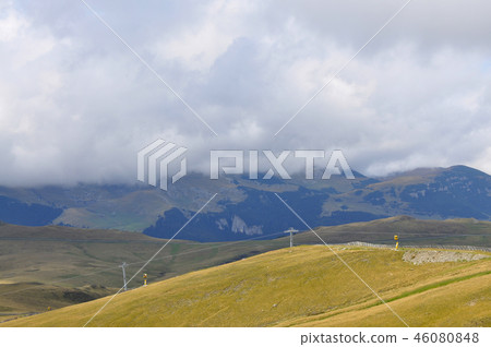 Summer hills with low clouds Summer hills with low clouds 46080848