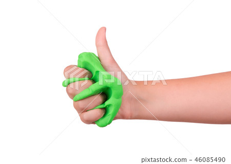 The child crushes the slime in his hand.  46085490