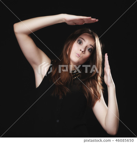 people concept - teenage girl making silly face 46085650