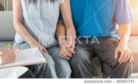 Patient couple having doctor consulting marriage Patient couple having doctor consulting marriage 46085742