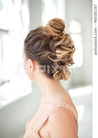 Hair Styling Rear View, Brown color Iroquois hair style on background. 46086197
