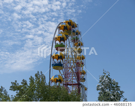 Atraktsion colorful ferris wheel against the sky 46088135