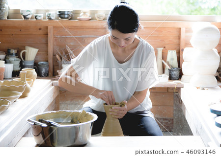 Pottery woman Pottery woman 46093146