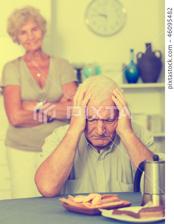Elderly upset man having problems in relationship with spouse 46095482