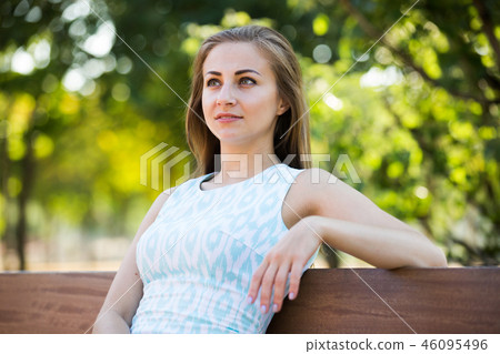 portrait of cheerful young woman portrait in outdoor 46095496