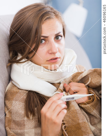 Ill girl measuring temperature Ill girl measuring temperature 46096165
