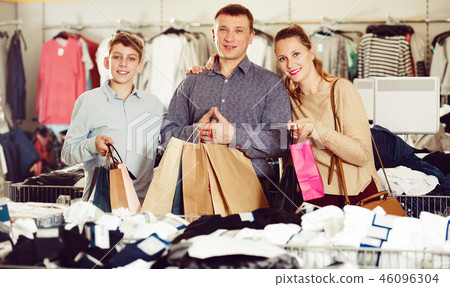 Family with purchases in shop Family with purchases in shop 46096304