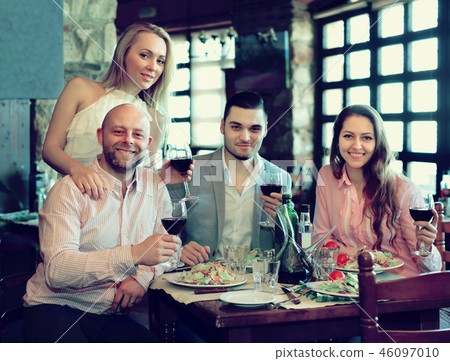 Two couple sitting at restaurant 46097010