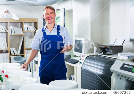 man standing in supermarket 46097262