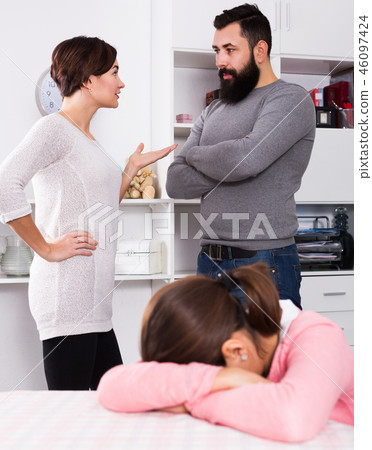 Father and mother having disagreement Father and mother having disagreement 46097424