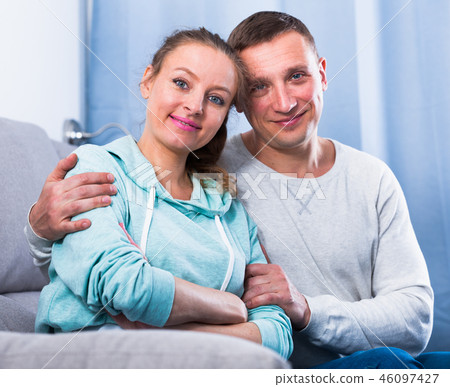 Couple enjoying evening at home Couple enjoying evening at home 46097427