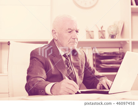 Man working productively 46097458