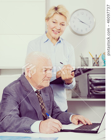 Manager and secretary working 46097737