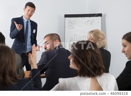Businessman discussing business project with team 46099328