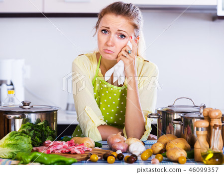Tired housewife at kitchen Tired housewife at kitchen 46099357