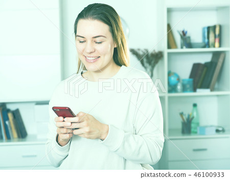 Girl is chatting on phone and happiness alone 46100933