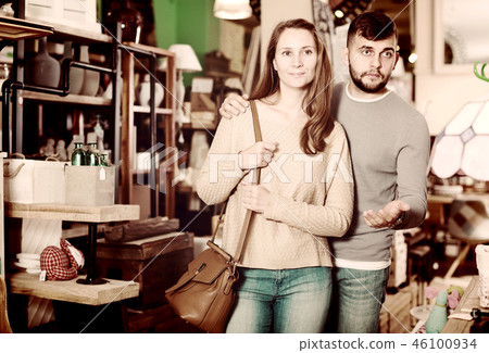 Happy couple in furnishings store Happy couple in furnishings store 46100934