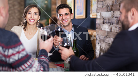 Company celebrating in restaurant 46101341