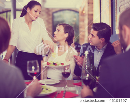 Angry couple conflict with waitress Angry couple conflict with waitress 46101597