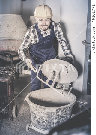 Worker work with cement mixer Worker work with cement mixer 46101771