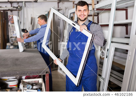 positive male professional labours with finished PVC profiles and windows positive male professional labours with finished PVC profiles and windows 46102186