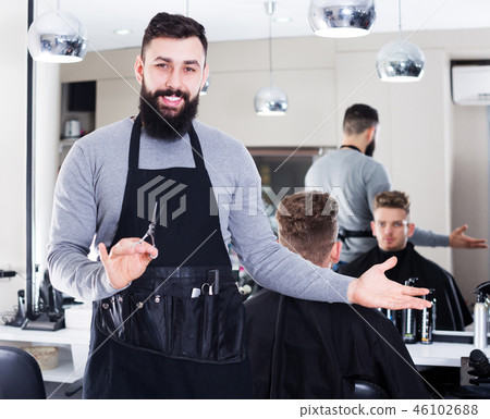 Hairdresser demonstrating his workplace Hairdresser demonstrating his workplace 46102688