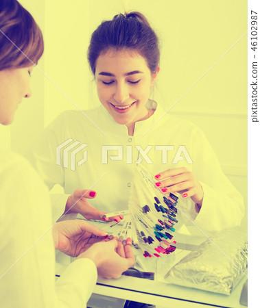 Woman doing manicure 46102987