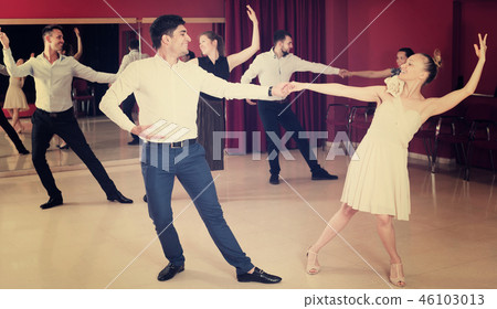 People practicing vigorous lindy hop movements 46103013