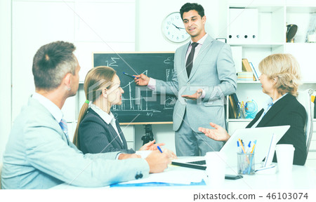Businessman presenting new strategy to partners Businessman presenting new strategy to partners 46103074