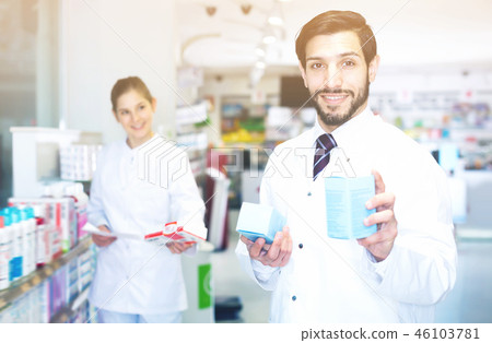 Modern specialist who is holding medicines Modern specialist who is holding medicines 46103781