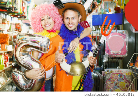 Smiling guy and girl are happy shopping 46103812