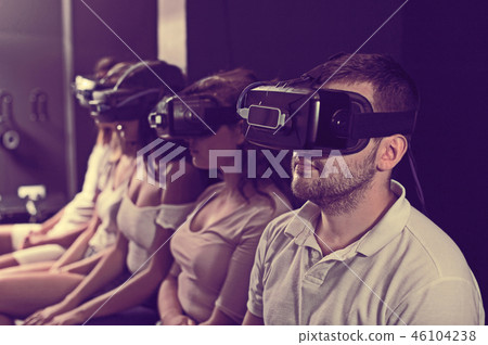People wearing virtual reality goggles 46104238