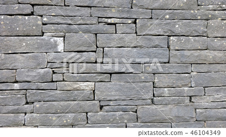 Horizontal texture of grey slate wall tiles Horizontal texture of grey slate wall tiles 46104349