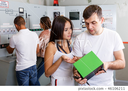 Young people with battery charger in lost room-bunker Young people with battery charger in lost room-bunker 46106211