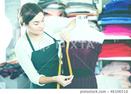 Tailor working at dress Tailor working at dress 46106518
