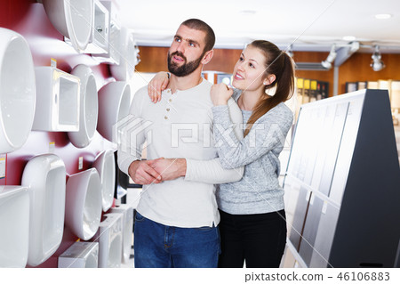 couple choosing bathroom sink 46106883