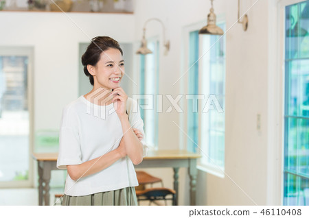 A young lady (in a natural room) A young lady (in a natural room) 46110408