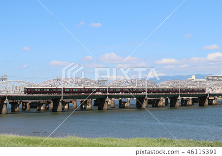 Hankyu train crossing the Yodogawa 46115391