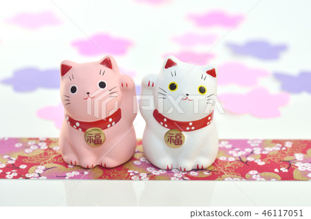Pink lucky beckoning cat with good luck and white lucky beckoning cat 46117051