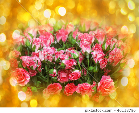 Pink roses in gold sequins Pink roses in gold sequins 46118786